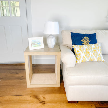 side table cat scratcher in driftwood with sisal in living room next to sofa